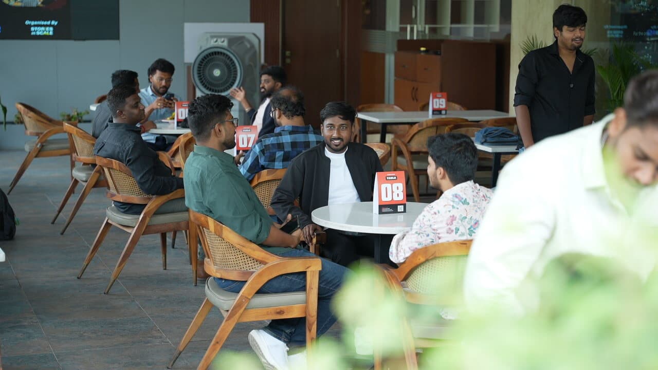 Guests seated around tables at the cafe