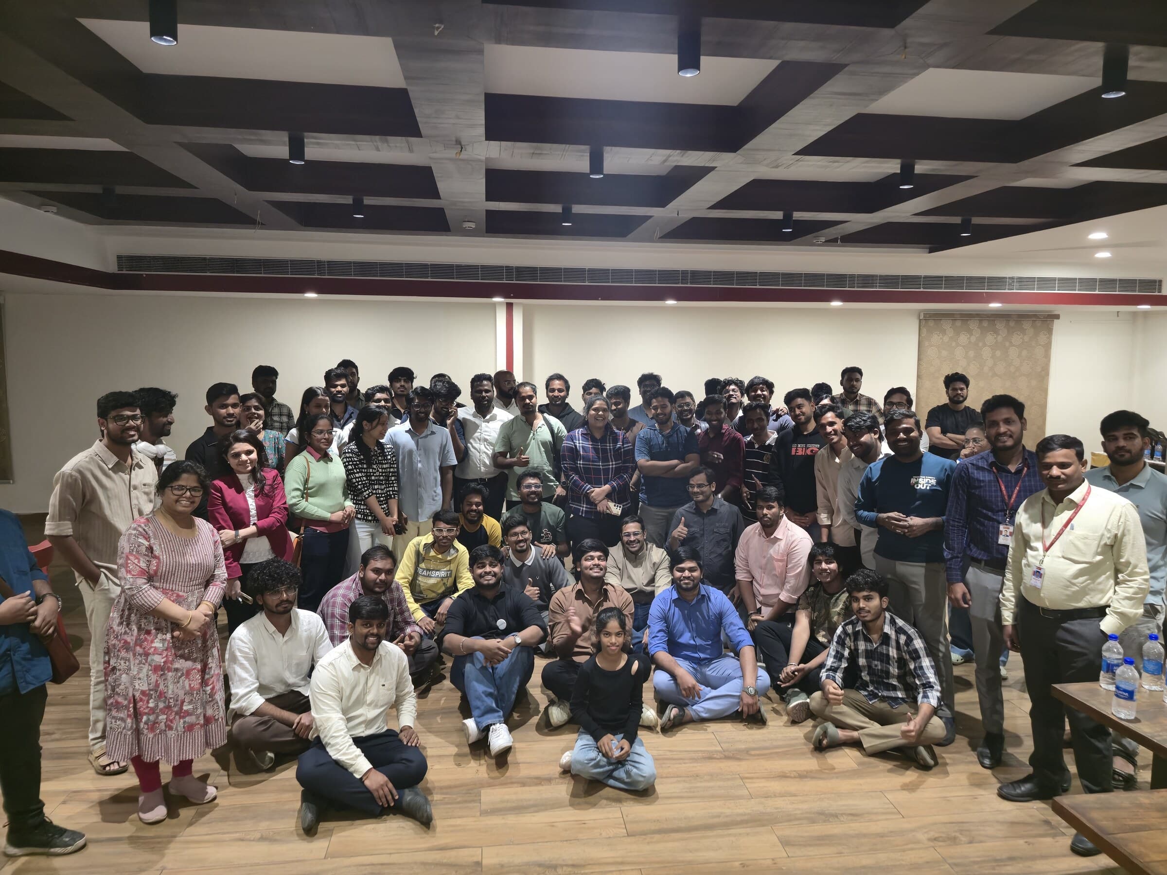 People listening during a founder conversation